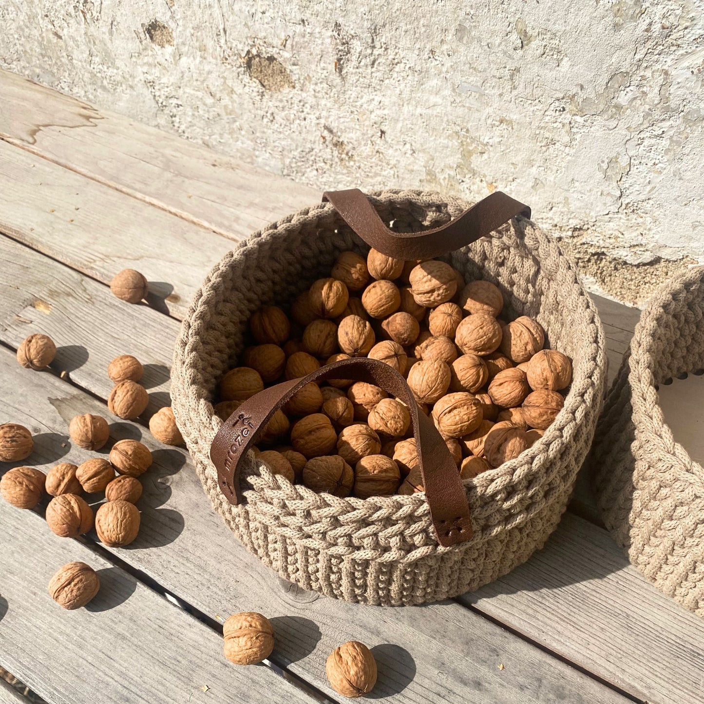 Beige crochet basket with leather handles