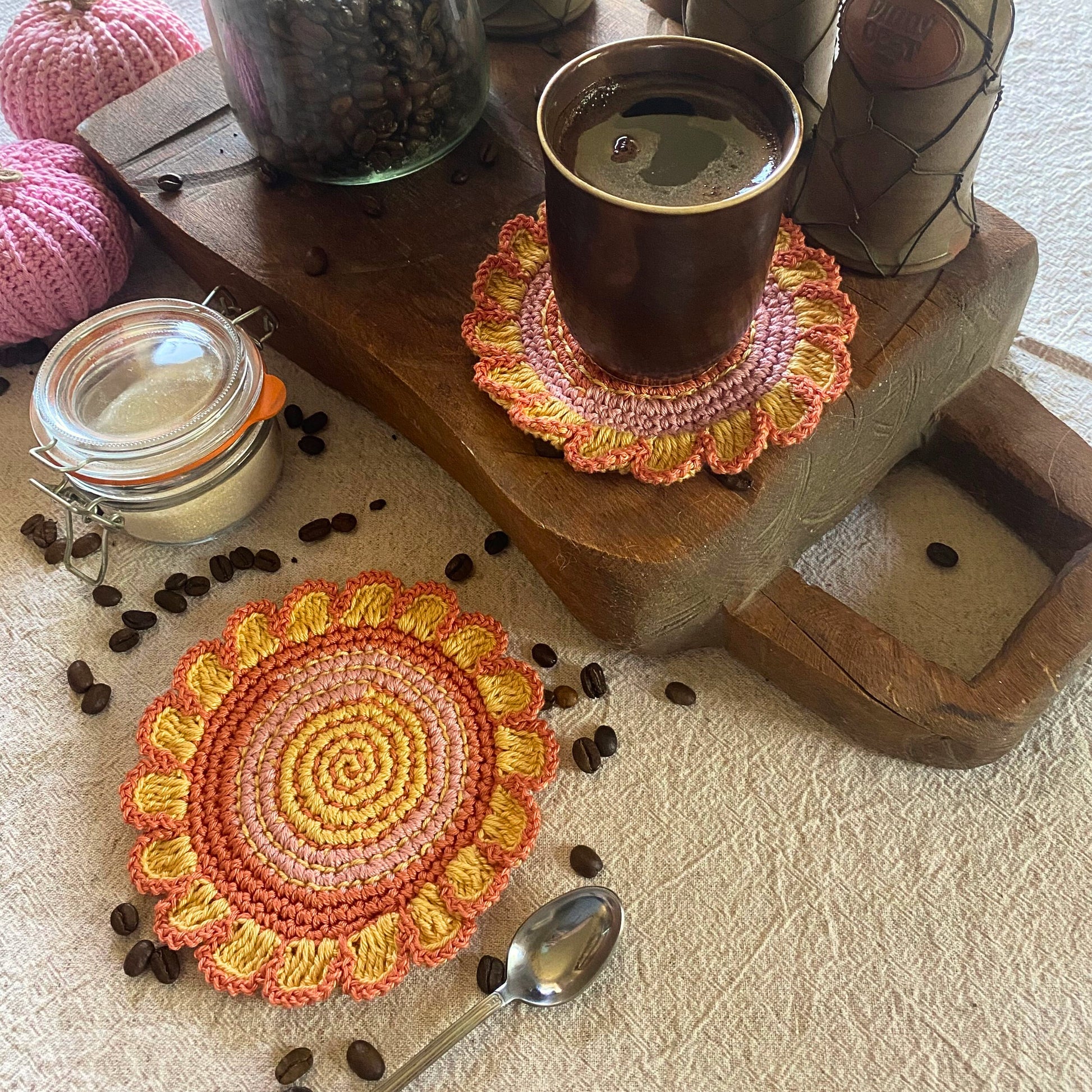 Cotton crochet flower coaster on table — boho decor