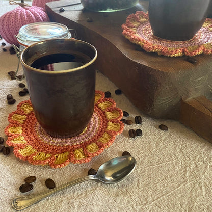 Crochet flower coaster detail with scalloped edge — cotton