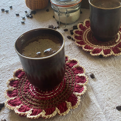 Cotton crochet flower coaster on table — boho decor
