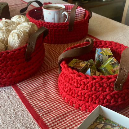 Red crochet basket with leather handles