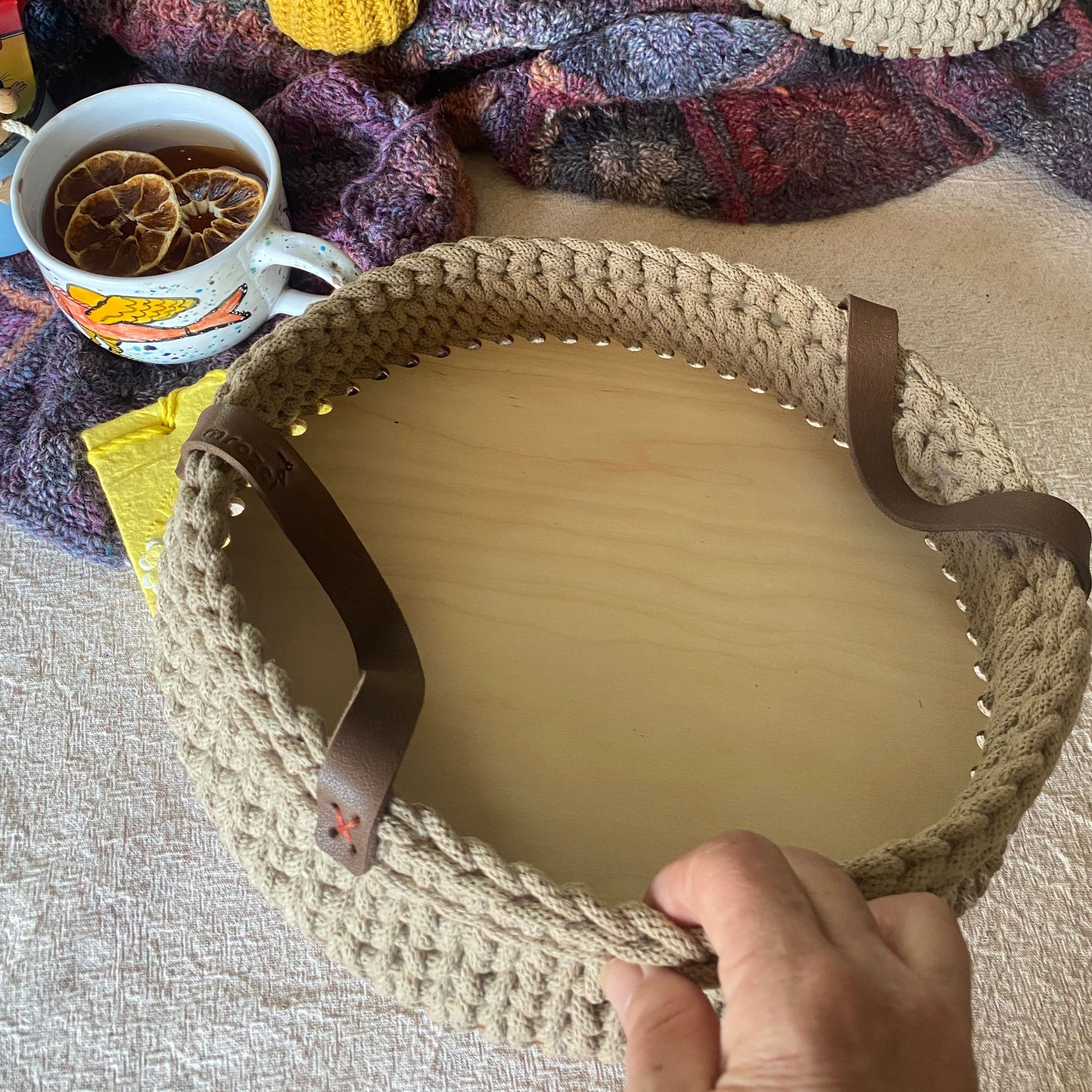 Crochet basket with solid plywood base, bottom view