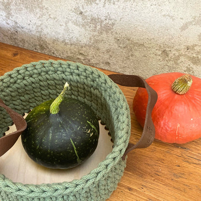 Crochet basket with solid plywood base, bottom view