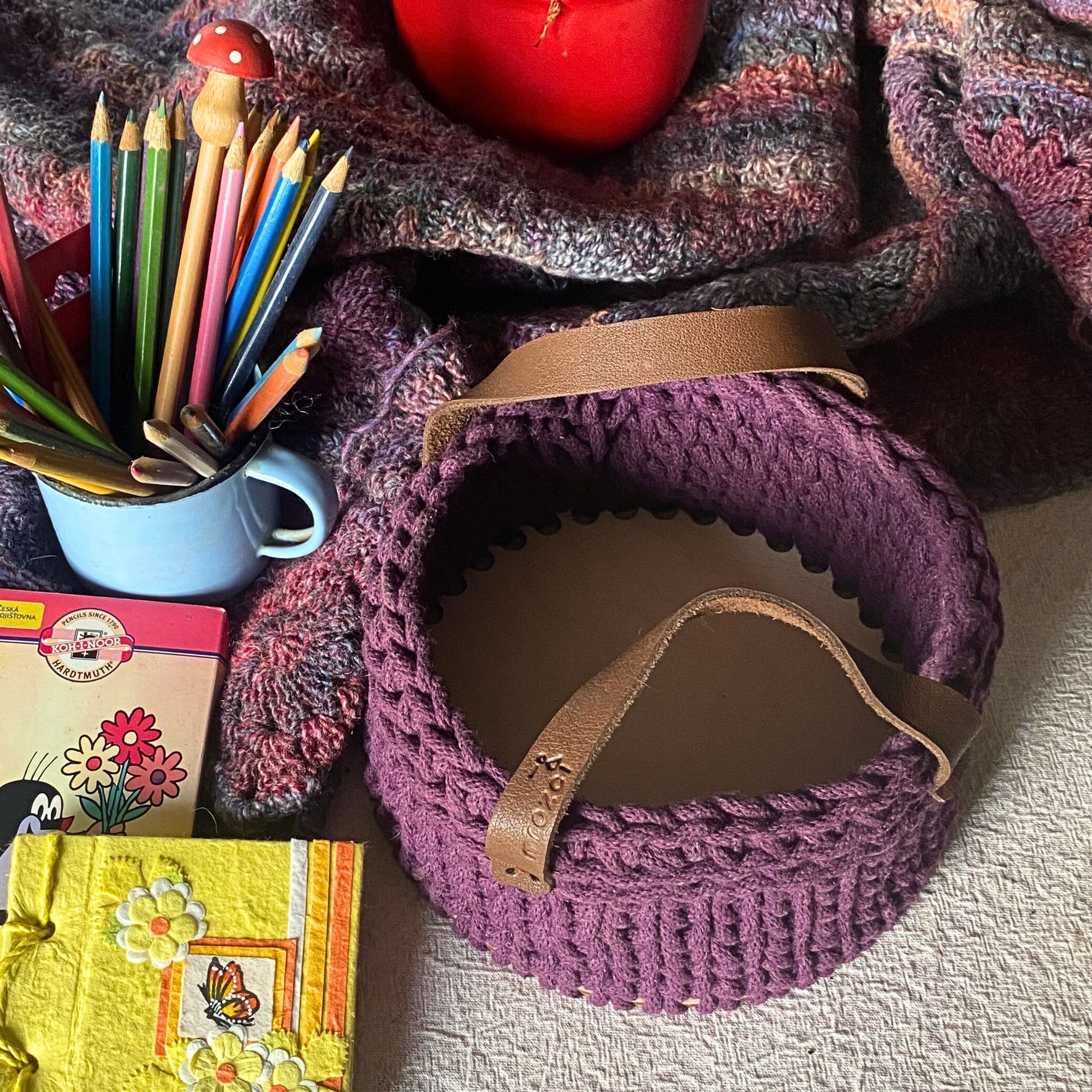 Crochet basket with solid plywood base, bottom view