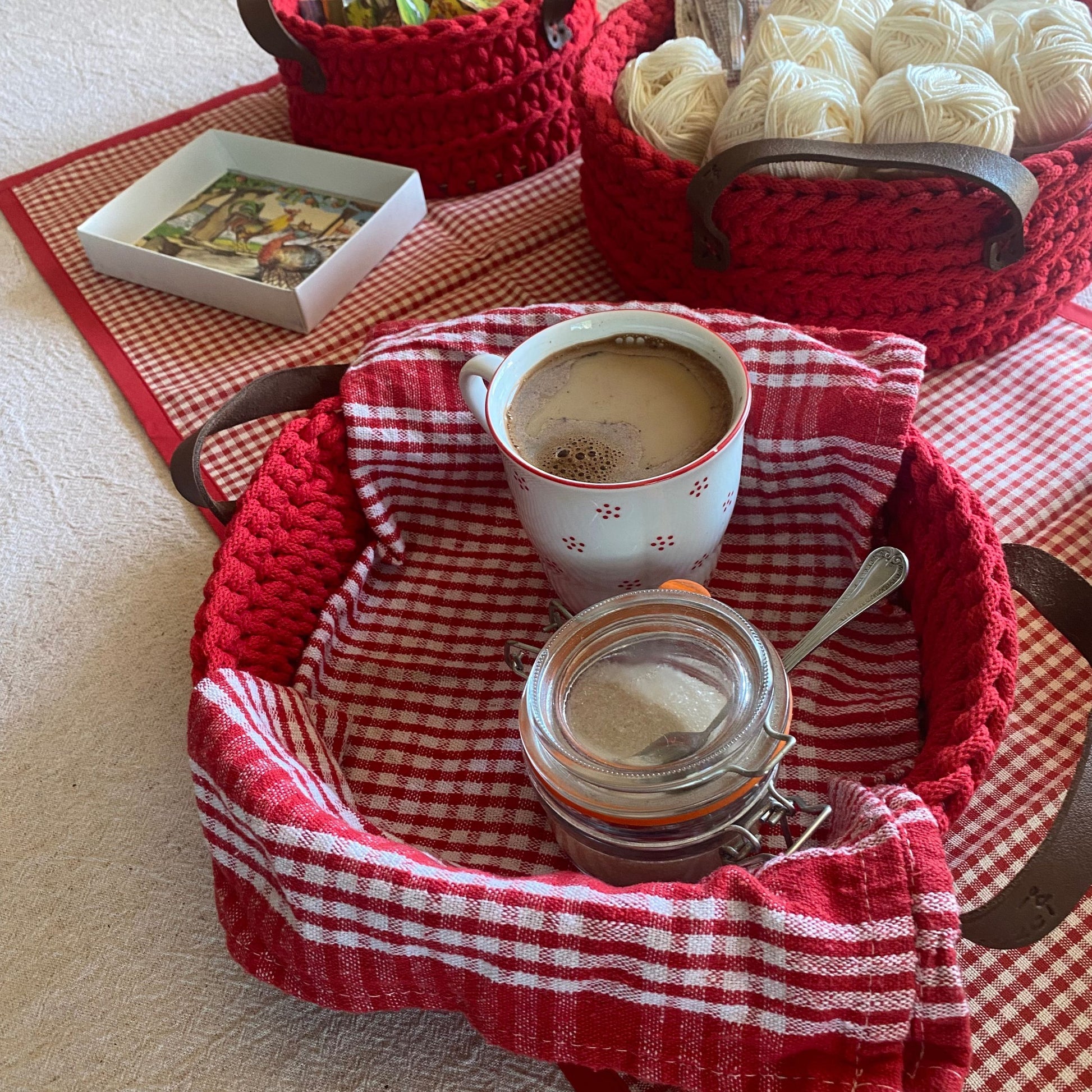 Red crochet basket with leather handles