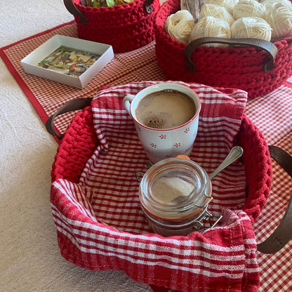 Red crochet basket with leather handles