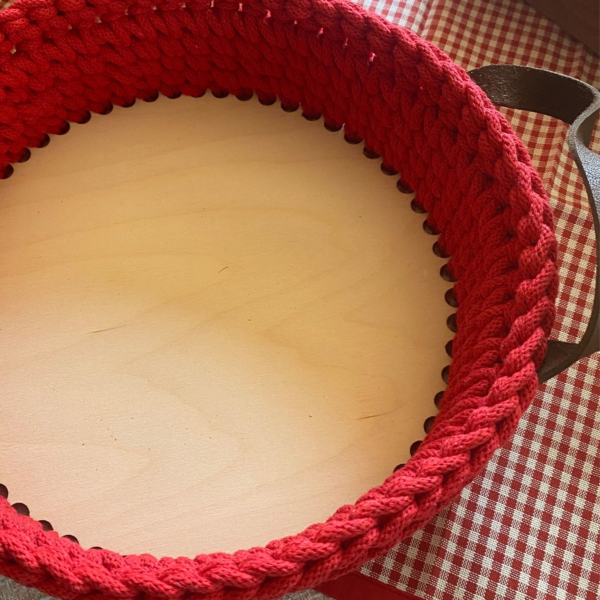 Crochet basket with solid plywood base, bottom view
