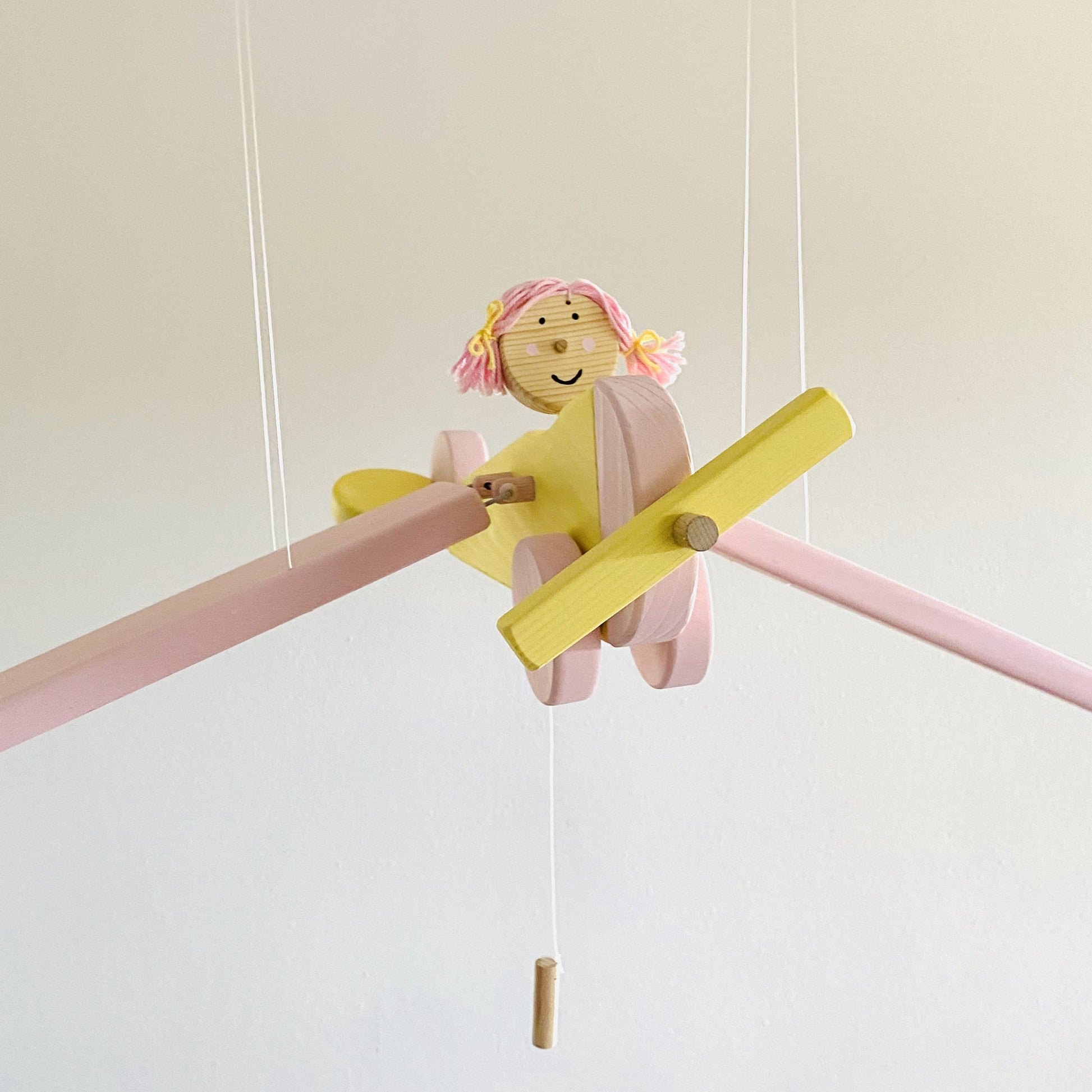 yellow airplane wooden toy