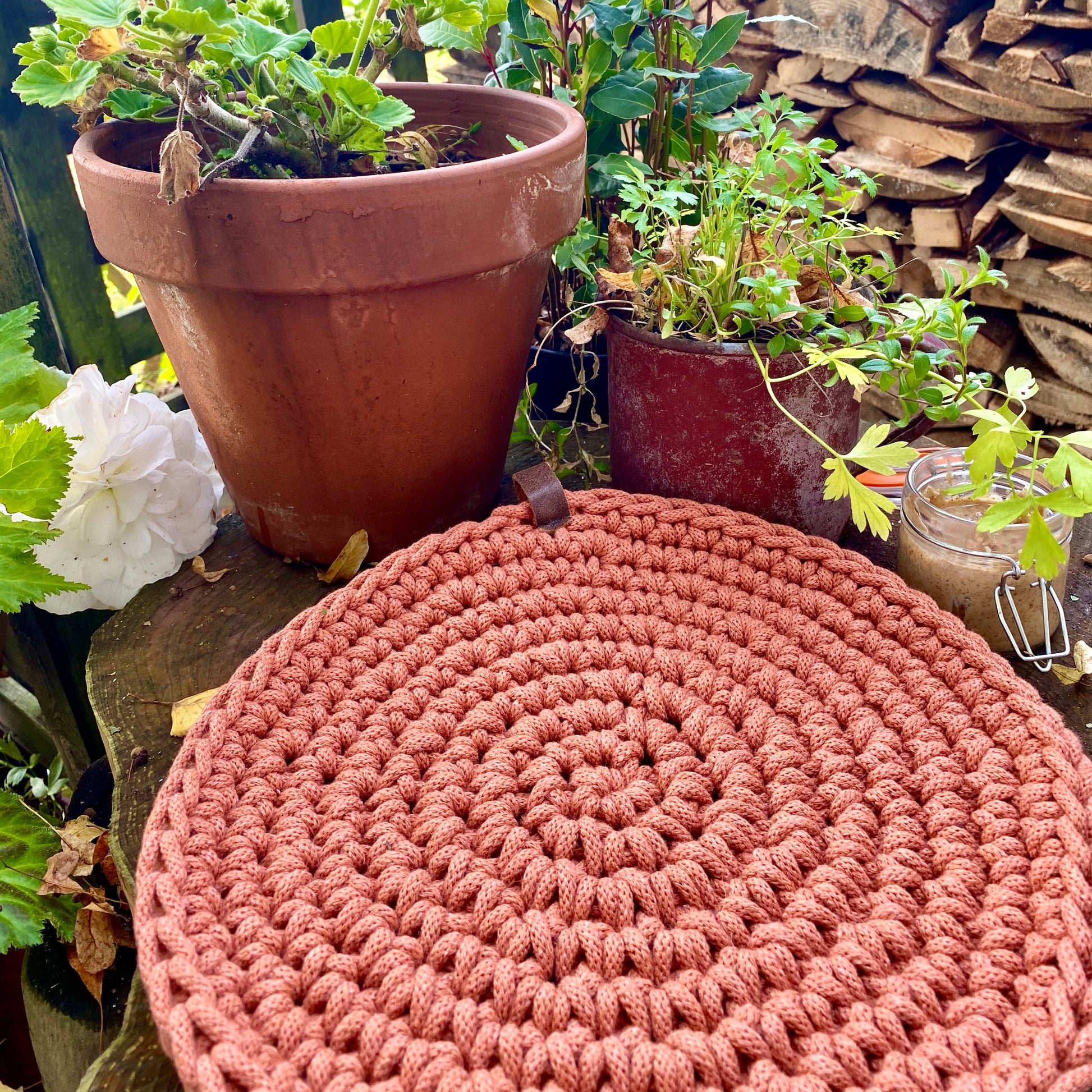 round cotton placemats with a leather loop